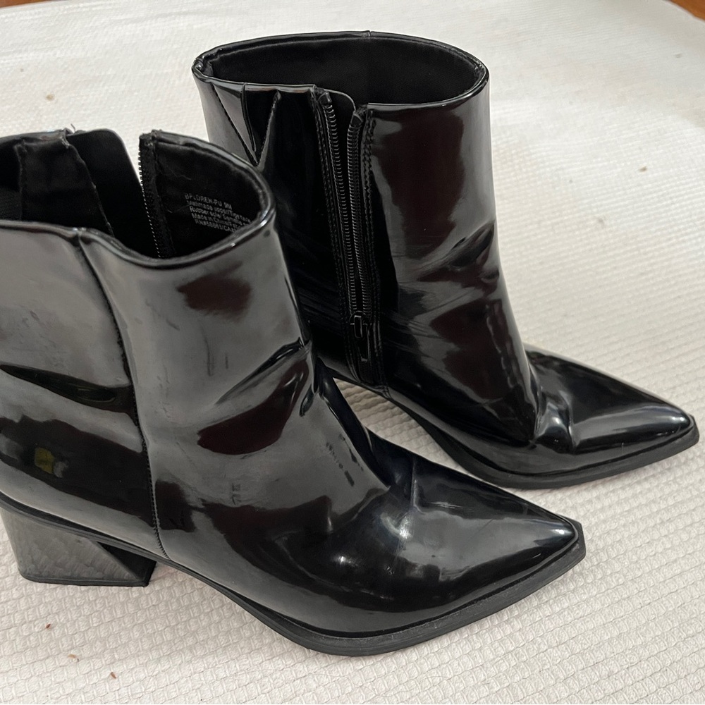 Black shiny patent ankle booties. 3 inch heels.